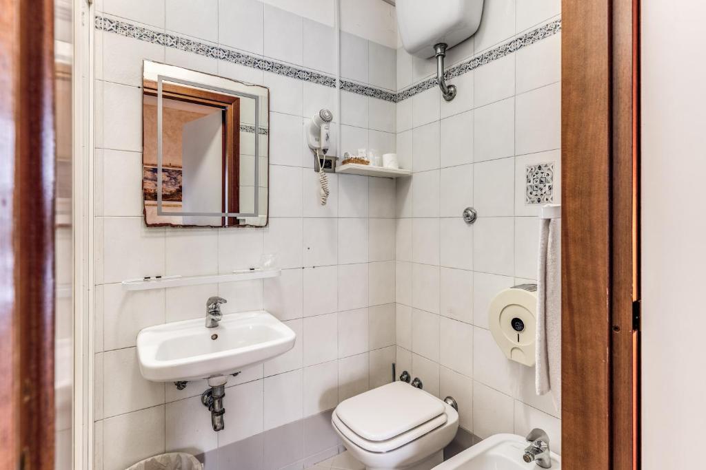 Koupelna v ubytování Hotel Milo