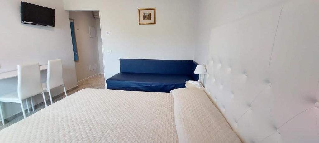 Posteľ alebo postele v izbe v ubytovaní Hotel Viña del Mar Pineta