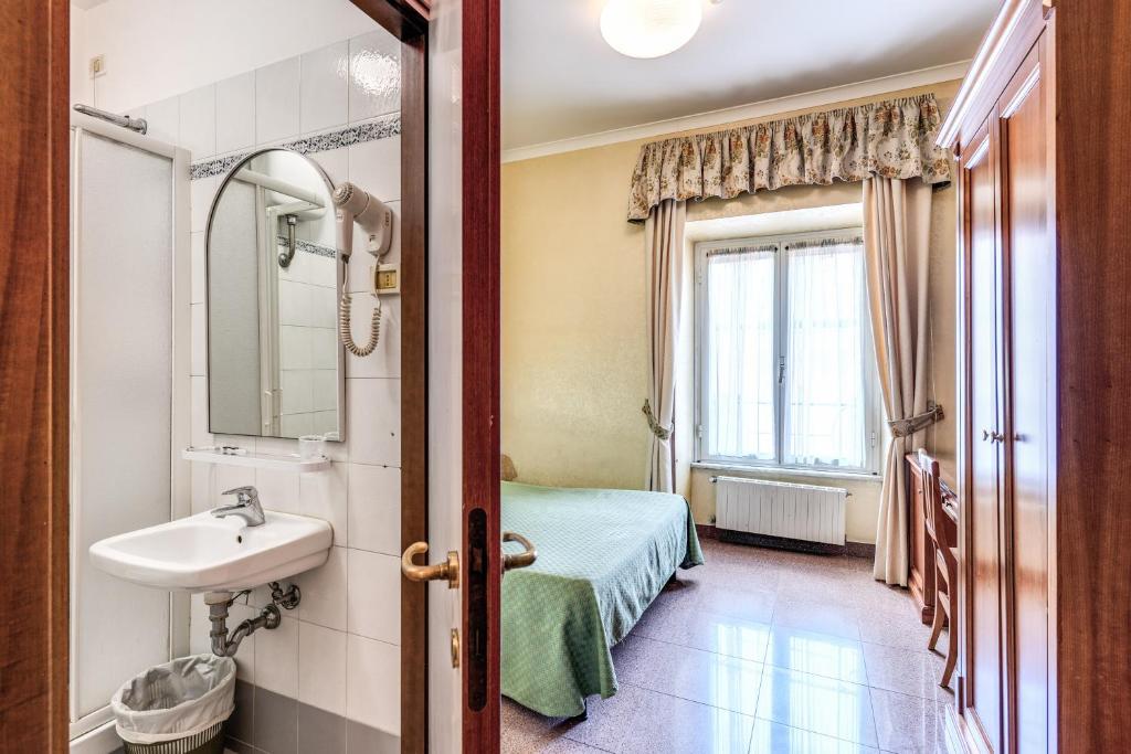 Koupelna v ubytování Hotel Milo