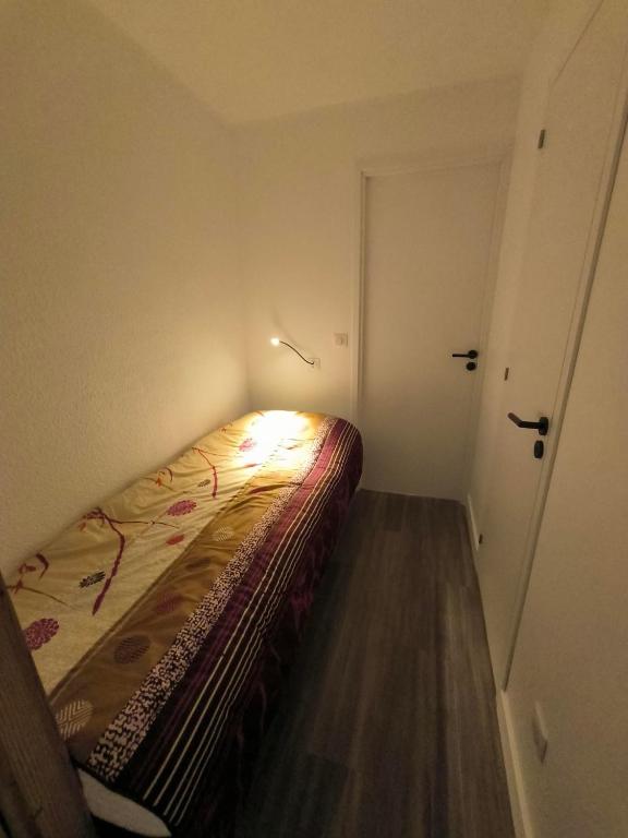 Postel nebo postele na pokoji v ubytování Roche Blanche Appartements VTI