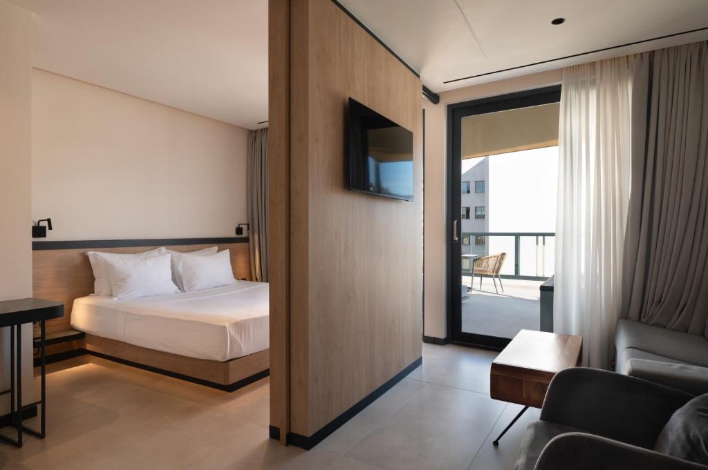 Postel nebo postele na pokoji v ubytování Nema Hotel Athens