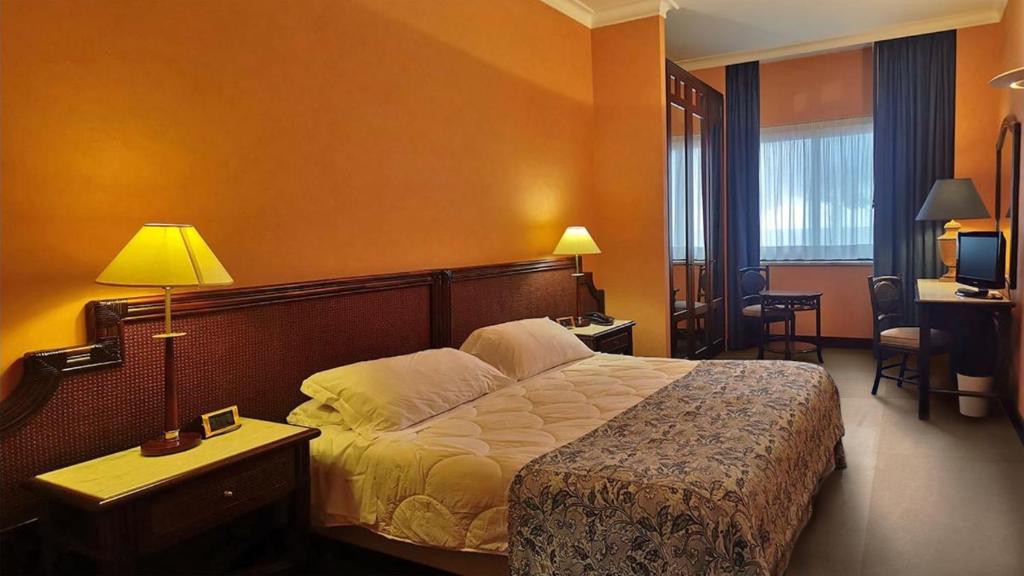 Łóżko lub łóżka w pokoju w obiekcie Hotel Schuhmann