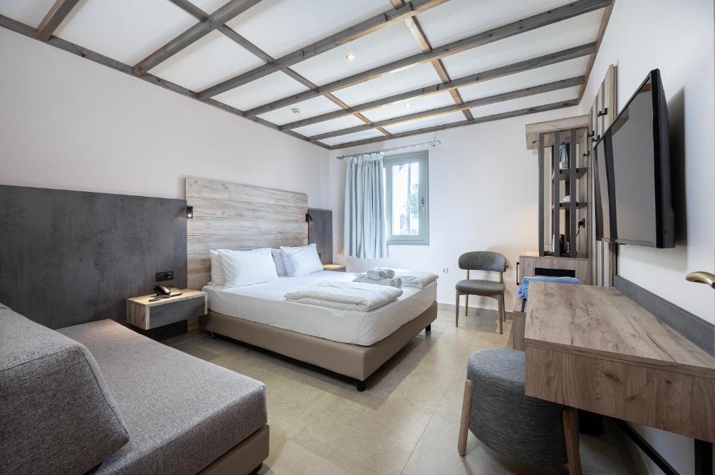 Postel nebo postele na pokoji v ubytování Palladium hotel