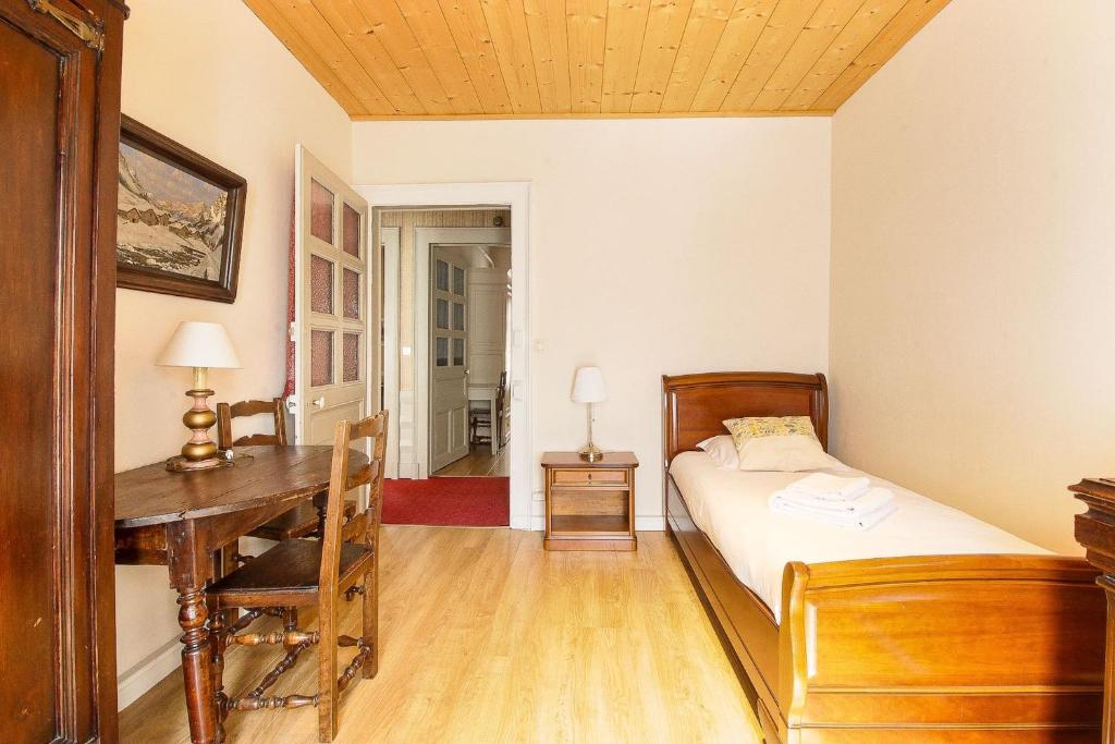 Posteľ alebo postele v izbe v ubytovaní Maison Emile Devouassoud