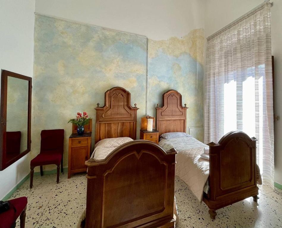 Letto o letti in una camera di Casa di Chiara