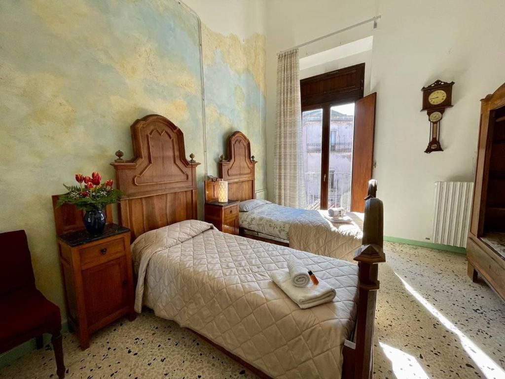 Letto o letti in una camera di Casa di Chiara