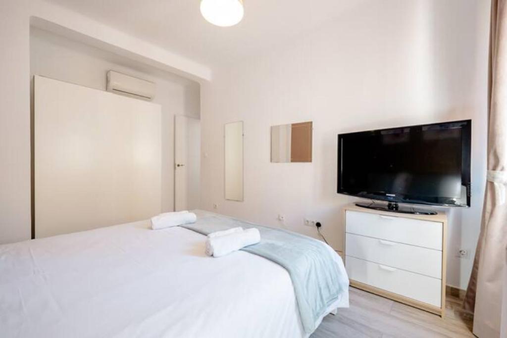 Televízia a/alebo spoločenská miestnosť v ubytovaní Apartamento Fuentecilla Céntrico