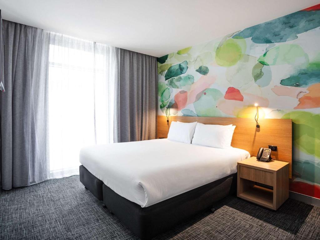 Postel nebo postele na pokoji v ubytování Ibis Styles Hobart