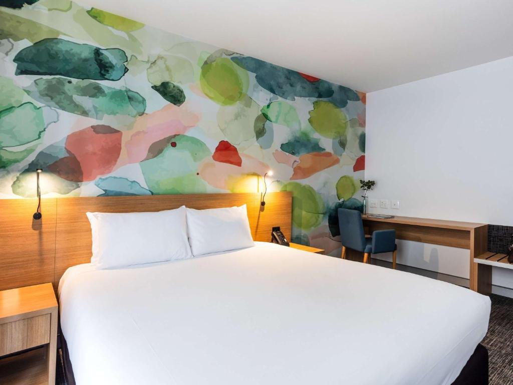 Postel nebo postele na pokoji v ubytování Ibis Styles Hobart