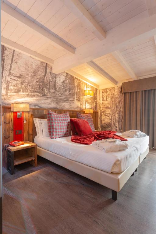 Postel nebo postele na pokoji v ubytování Olimpia Hotel