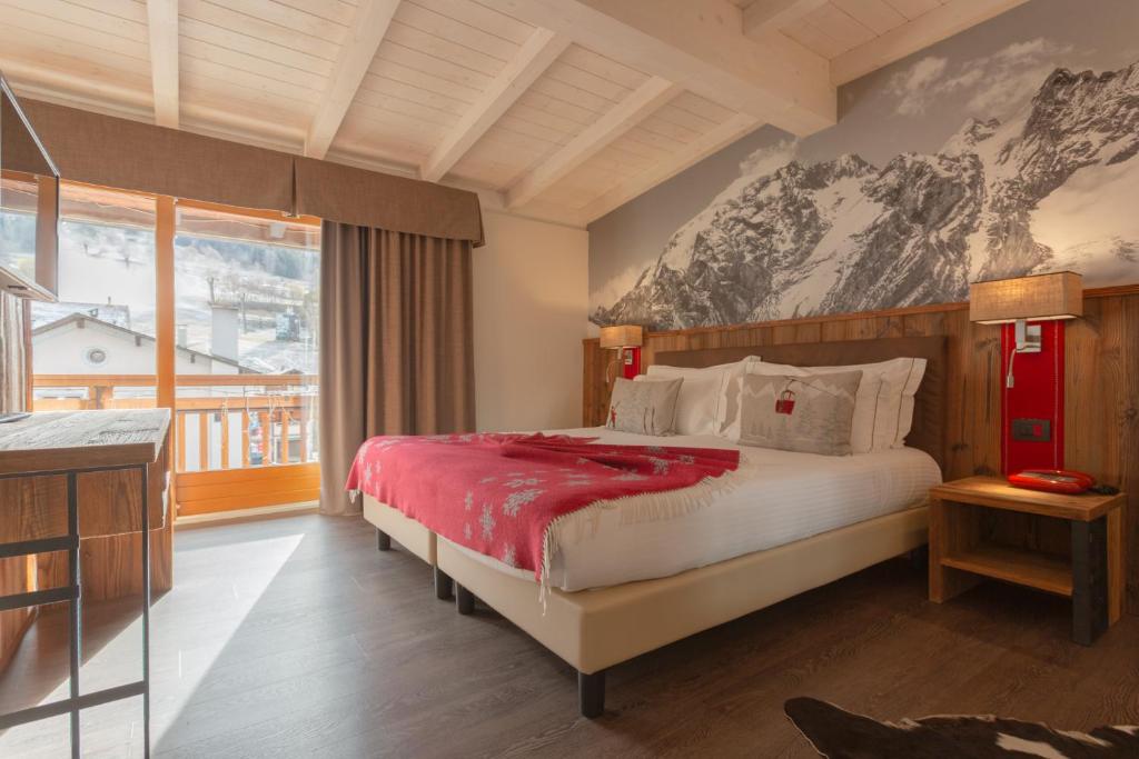 Postel nebo postele na pokoji v ubytování Olimpia Hotel
