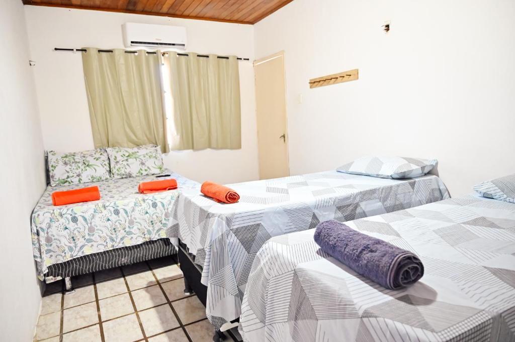 Postel nebo postele na pokoji v ubytování Hostel mineiros