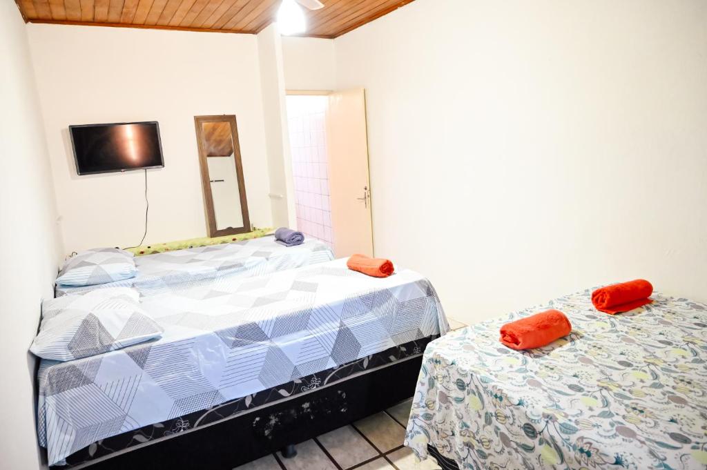 Postel nebo postele na pokoji v ubytování Hostel mineiros