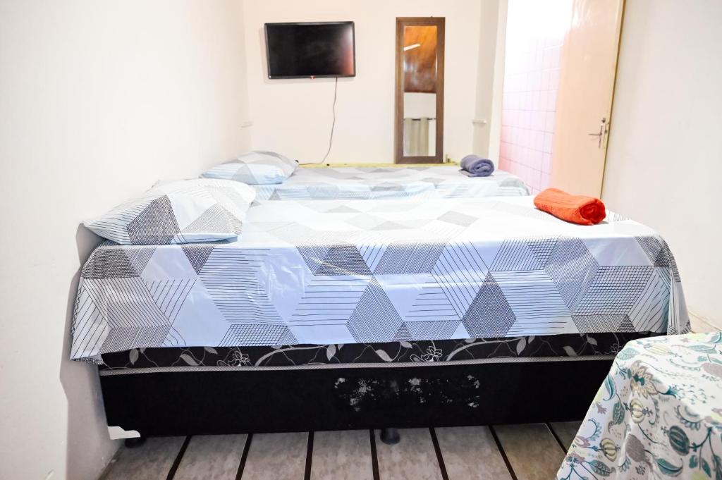 Postel nebo postele na pokoji v ubytování Hostel mineiros