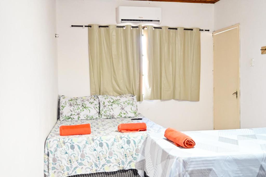 Postel nebo postele na pokoji v ubytování Hostel mineiros