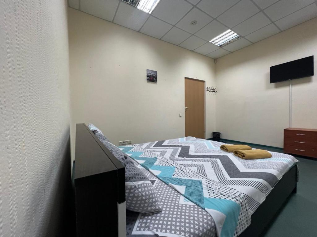 Postel nebo postele na pokoji v ubytování Міні-готель "Старовокзальний"