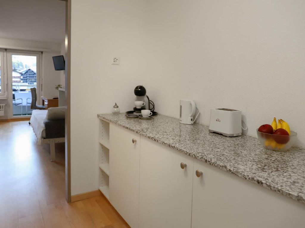 Kuchyň nebo kuchyňský kout v ubytování Apartment Residence A-3 by Interhome
