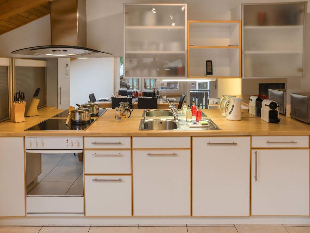 Kuchyň nebo kuchyňský kout v ubytování Apartment Brigitte by Interhome