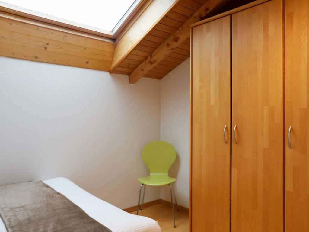 Postel nebo postele na pokoji v ubytování Apartment Brigitte by Interhome