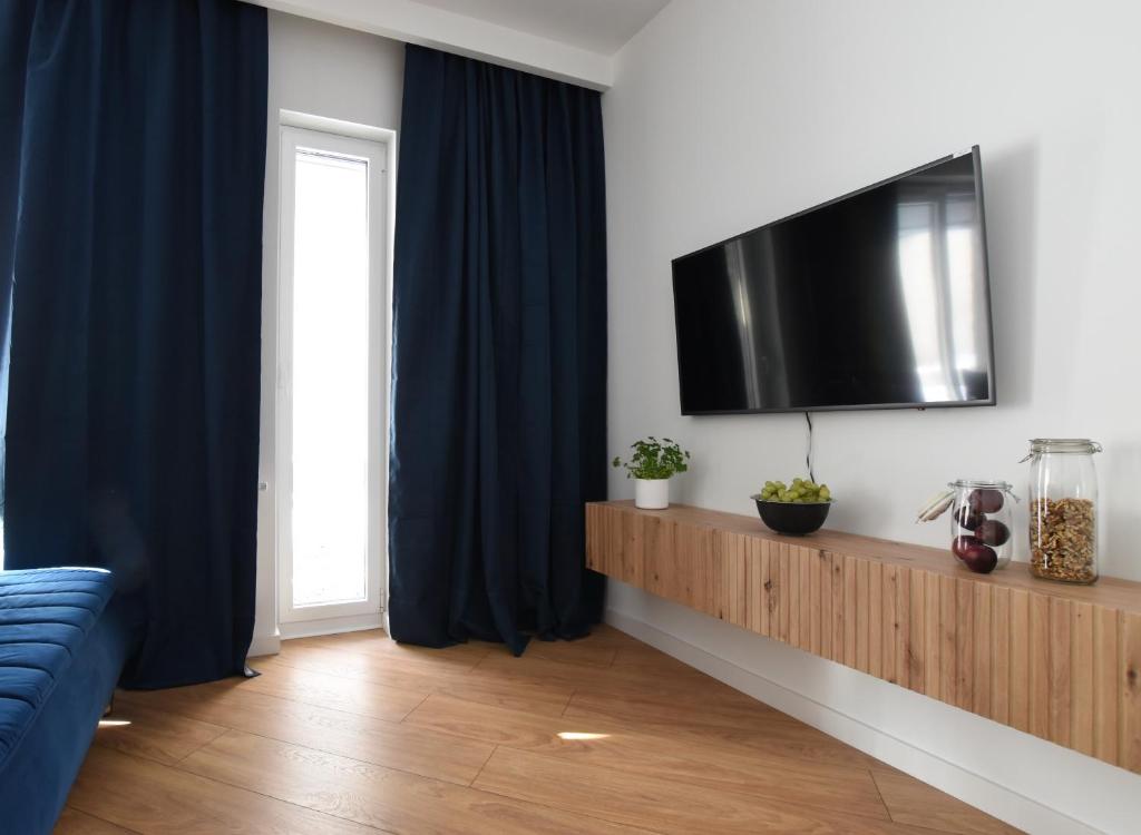 TV a/nebo společenská místnost v ubytování Apartament Wisła Siglany