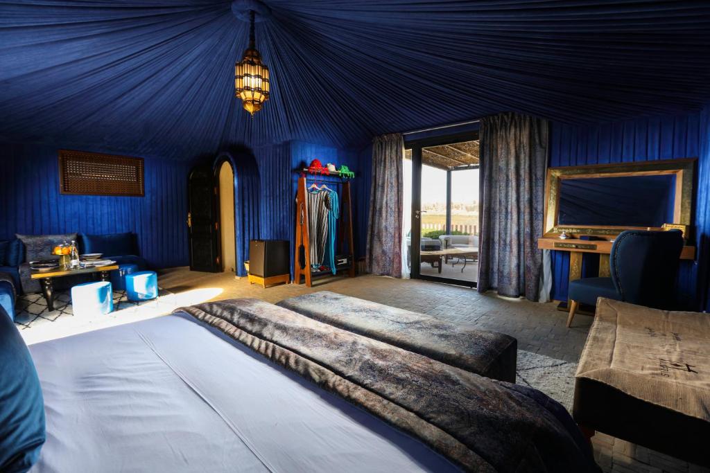 Postel nebo postele na pokoji v ubytování Kalyptus Luxury Camp