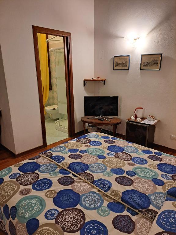 Postel nebo postele na pokoji v ubytování Locanda Ca' Formosa