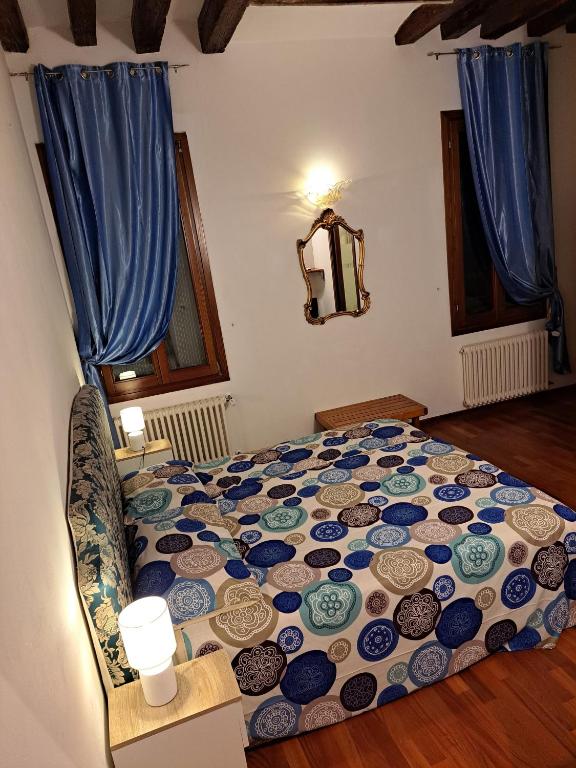 Postel nebo postele na pokoji v ubytování Locanda Ca' Formosa