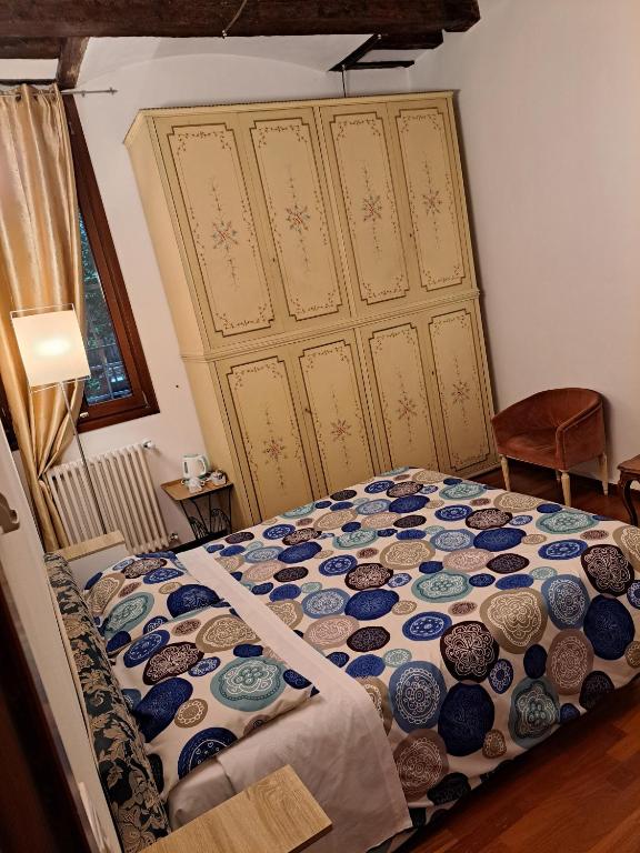Postel nebo postele na pokoji v ubytování Locanda Ca' Formosa