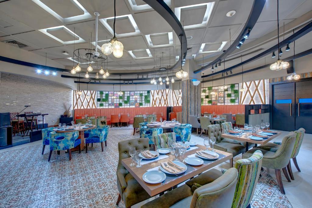 Grandeur Hotel Al Barsha - Resim 37