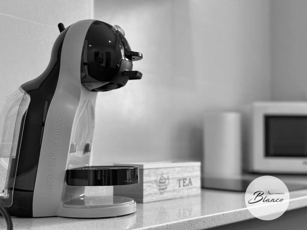 Kuchyň nebo kuchyňský kout v ubytování Apartamentos Blanco & Negro