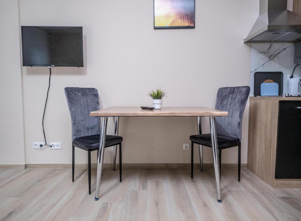 TV a/nebo společenská místnost v ubytování Main Boardinghouse