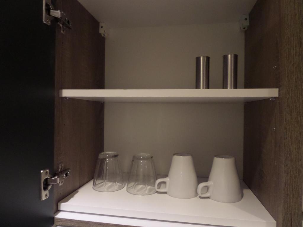 Kuchyň nebo kuchyňský kout v ubytování Main Boardinghouse