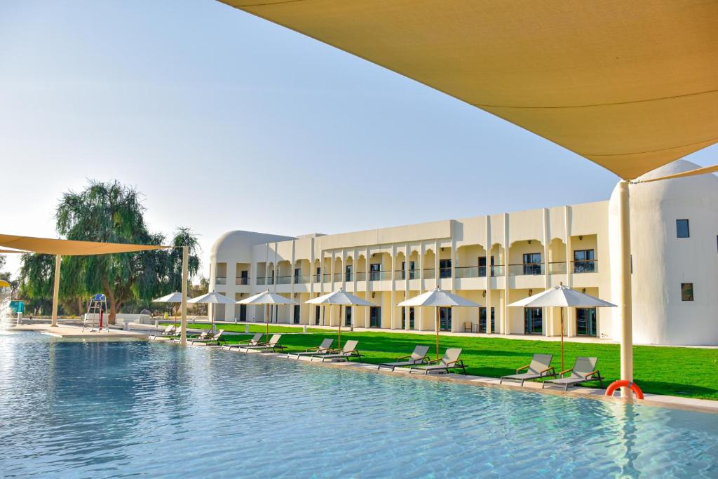 Bazén v ubytování Western Hotel Liwa nebo v jeho okolí
