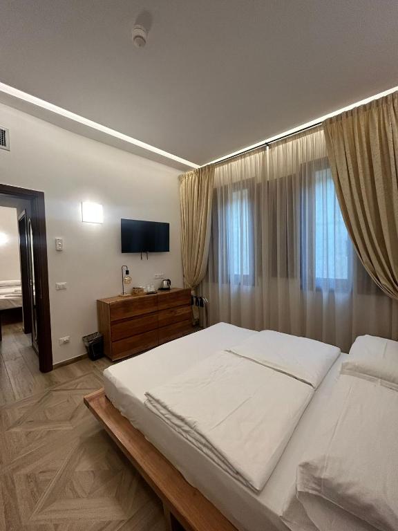 Postel nebo postele na pokoji v ubytování Hotel Le Due Fontane