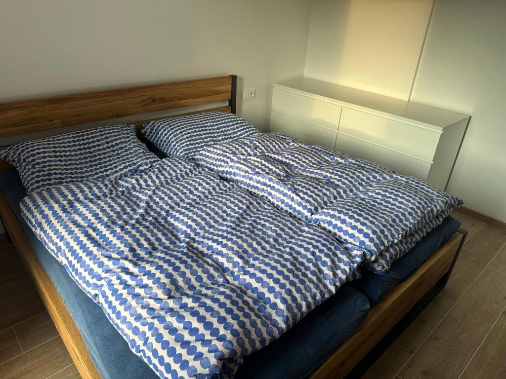 Postel nebo postele na pokoji v ubytování Maříž 77