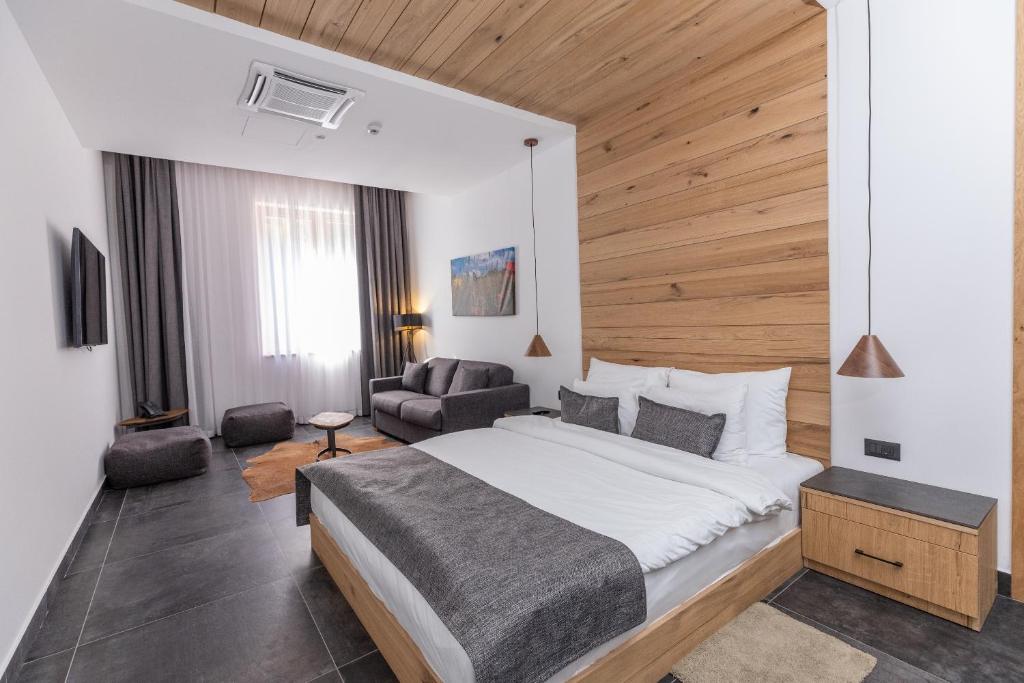 Letto o letti in una camera di Hotel Ramonda
