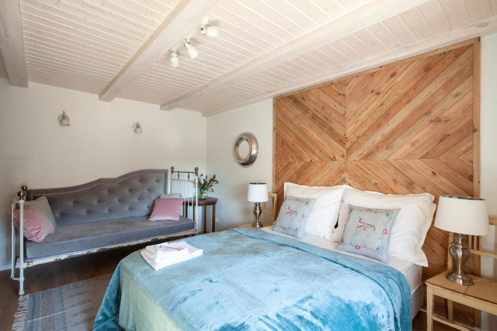 Łóżko lub łóżka w pokoju w obiekcie Stajnia Lipnik Apartments