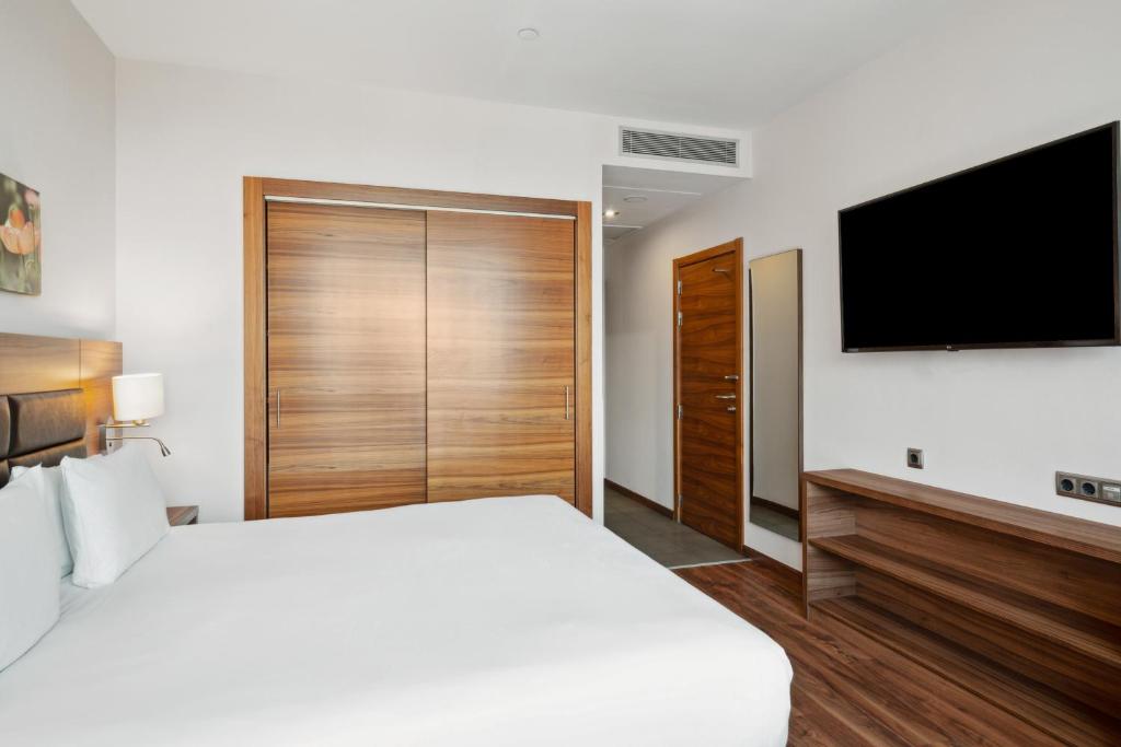 Posteľ alebo postele v izbe v ubytovaní Hilton Garden Inn Sevilla