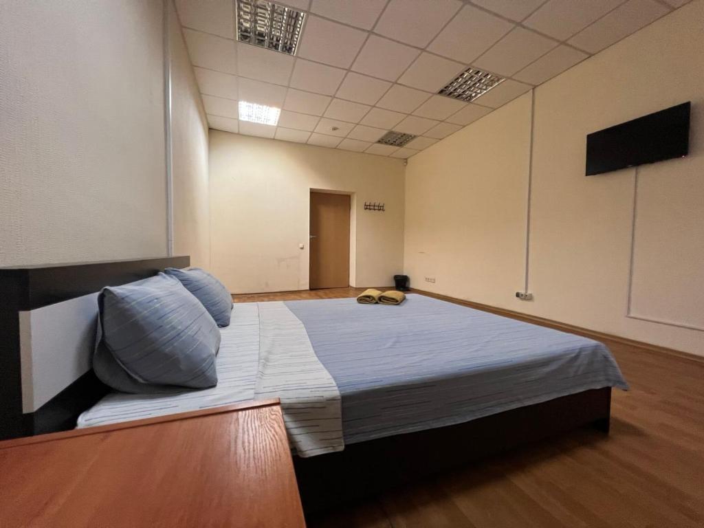Postel nebo postele na pokoji v ubytování Міні-готель "Старовокзальний"