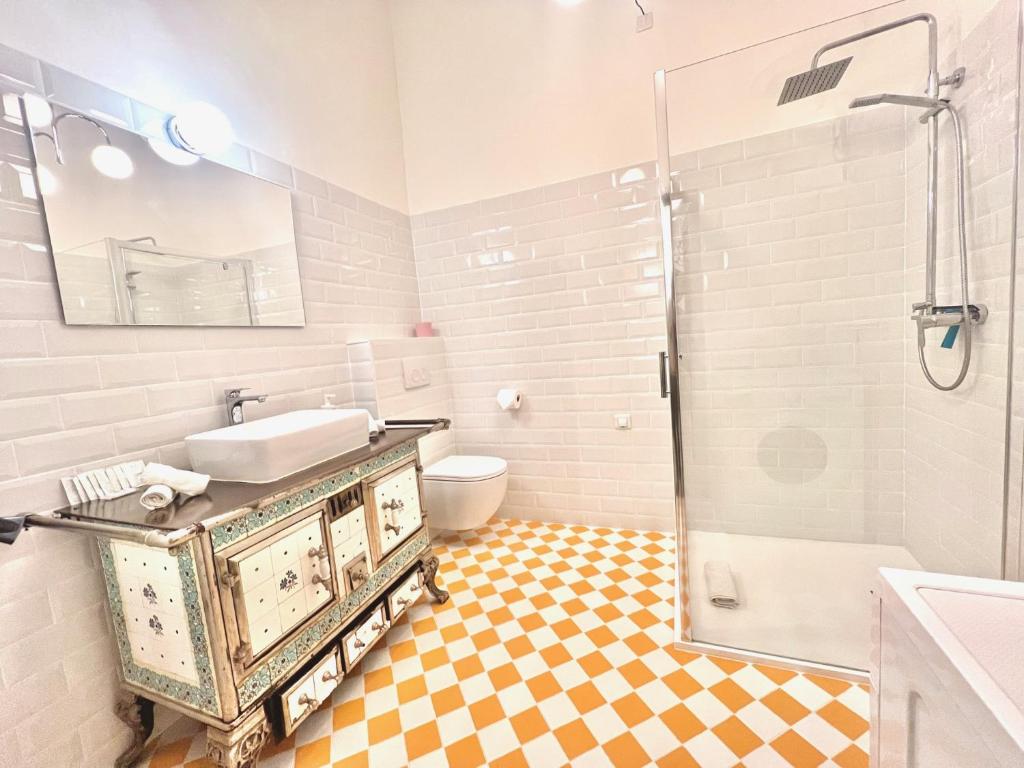 a bathroom with a sink and a shower at ApartHotel Riviera - CCC OT Loft du Chateau Old Town Prom des Anglais in Nice