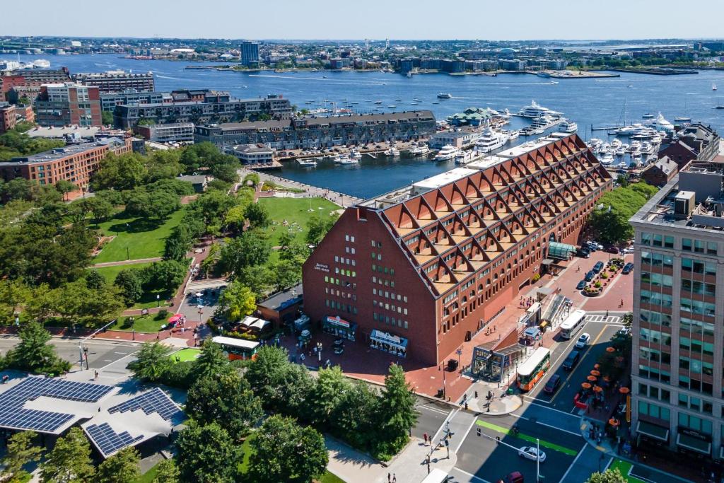 an aerial view of a large building next to a river at Boston Marriott Long Wharf in Boston