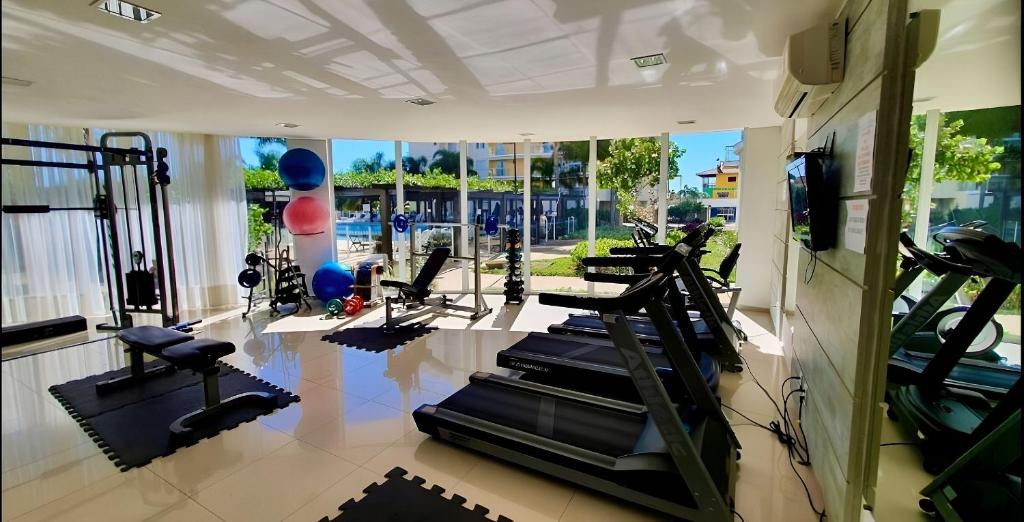 a gym with treadmills and elliptical machines at Beto Carrero, vista Espetacular do mar, Home Club in Penha