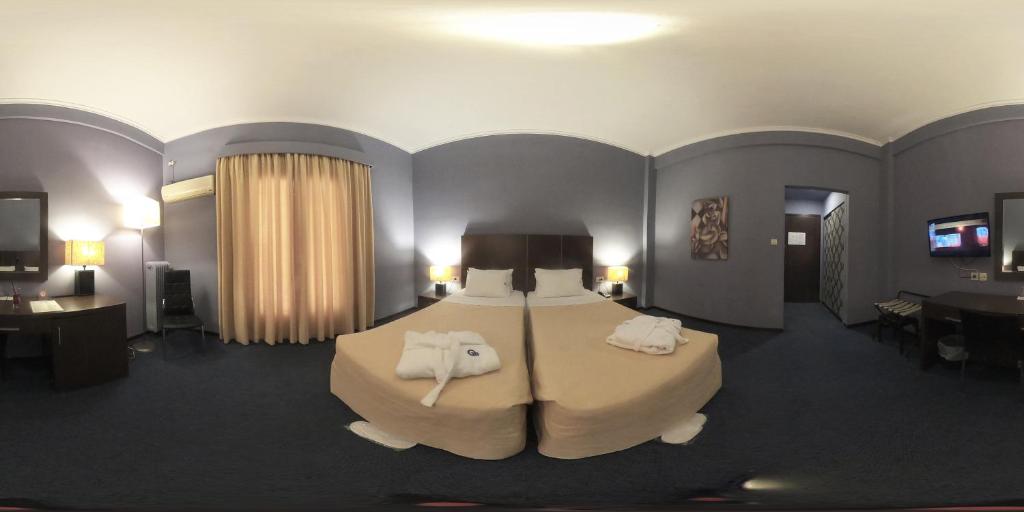 TV a/nebo společenská místnost v ubytování Galini Hotel