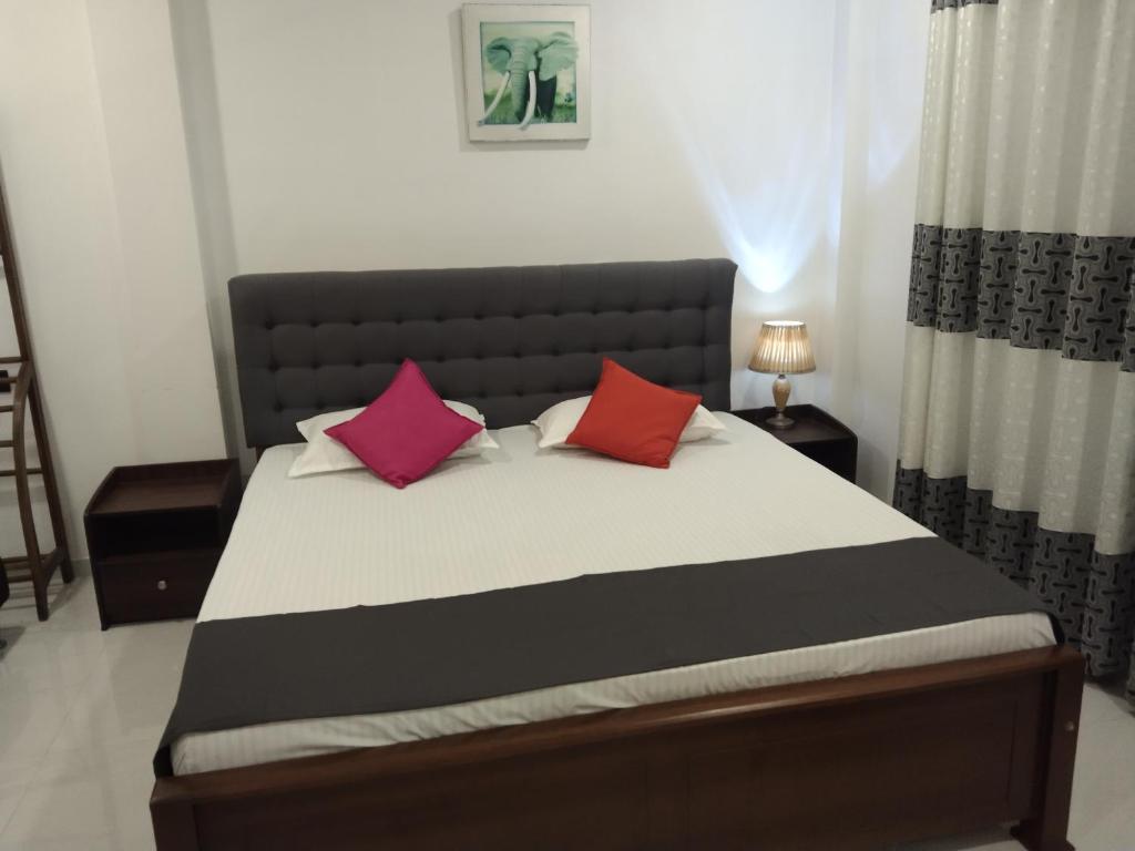 Voodi või voodid majutusasutuse Hotel Sapid Luck Yala Safari toas