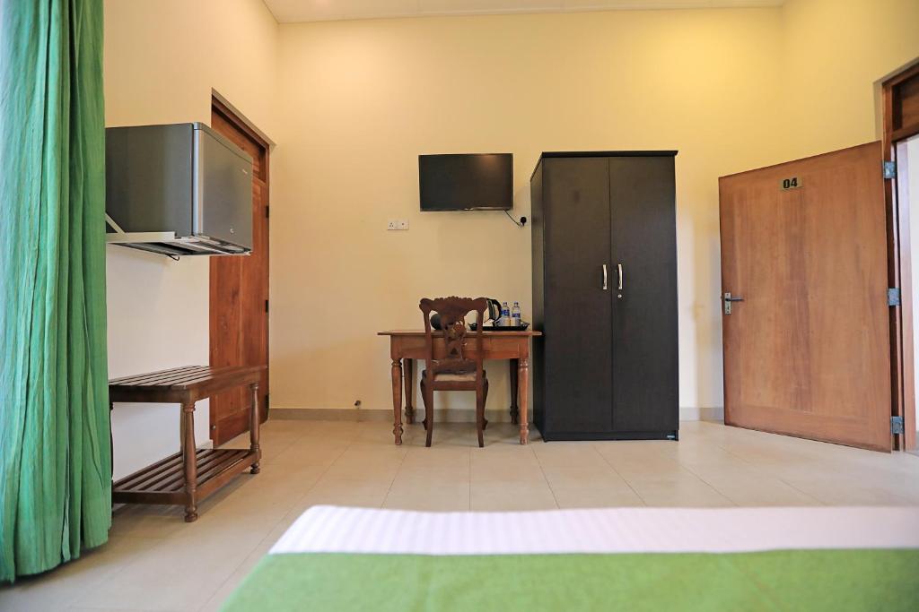 TV a/nebo společenská místnost v ubytování D Plus Resort Negombo