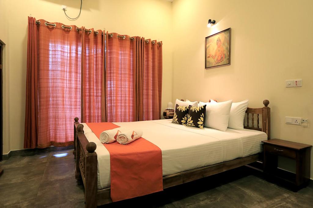 Postel nebo postele na pokoji v ubytování D Plus Resort Negombo