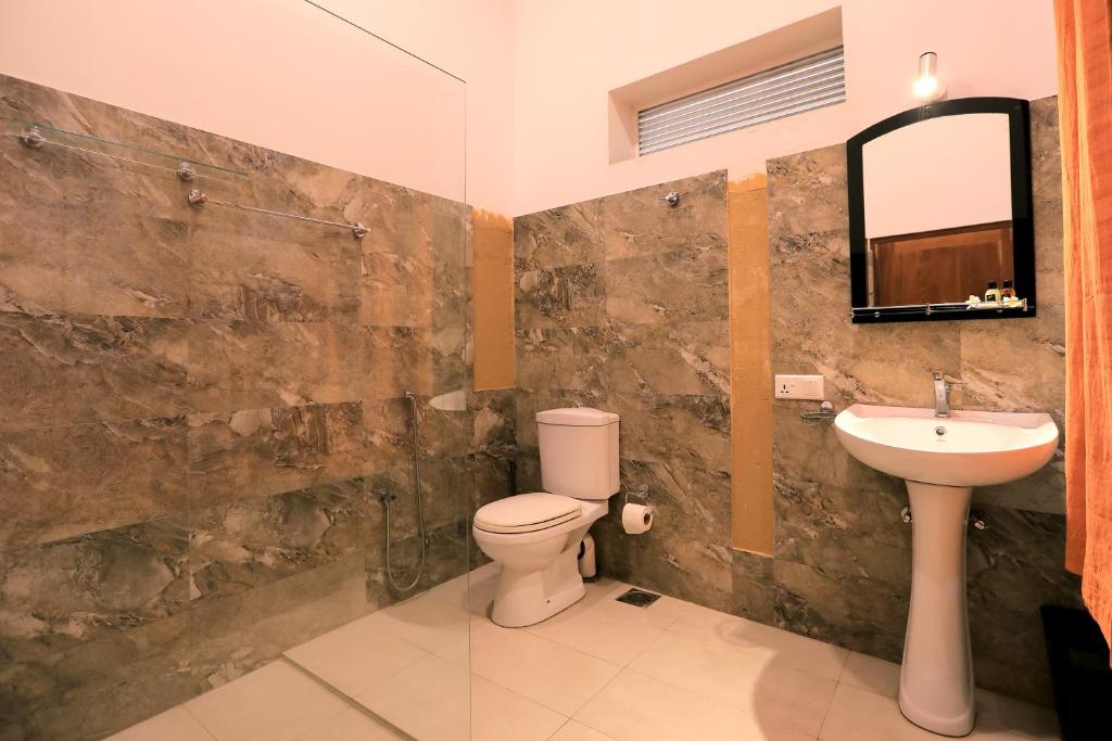 Koupelna v ubytování D Plus Resort Negombo