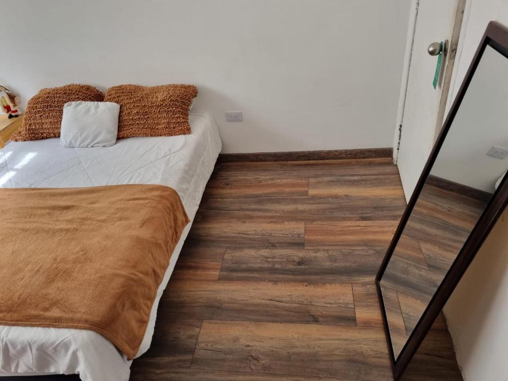 Postel nebo postele na pokoji v ubytování Mosaic House Hotel