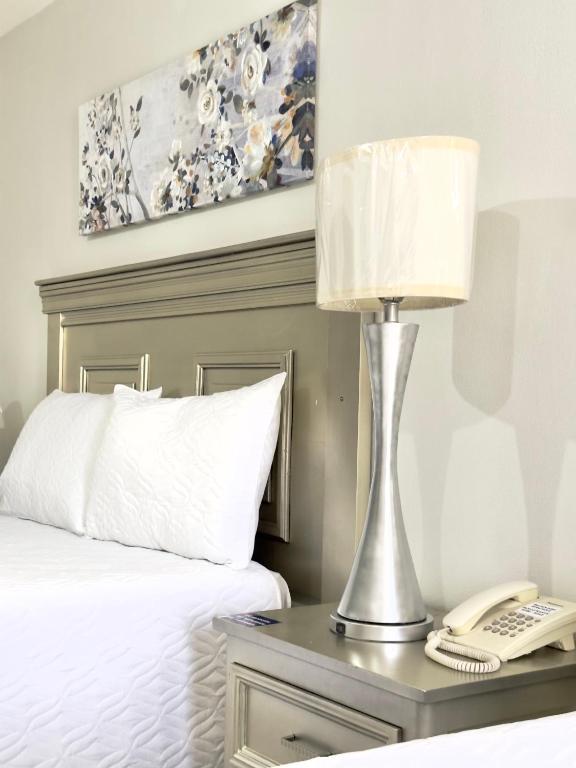 Postel nebo postele na pokoji v ubytování Gran Hotel Paris