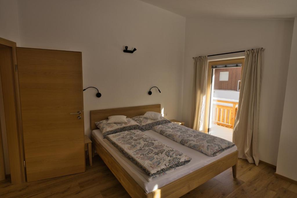 Postel nebo postele na pokoji v ubytování Haus Timmler